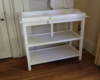 Wonderful, wooden changing table!! And there is a matching baby bed in the garage. You don't see this in wood any more! Upstairs in northeast bedroom.