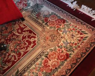 Detail of the handmade, wool and silk rug in the dining room.