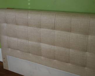 Detail of the fabric on the queen upholstered headboard. It is indestructible! Master bedroom, upstairs, on the left. 