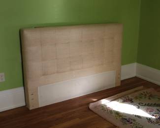 This is a cool queen size upholstered headboard. Upstairs in the master bedroom, south side of the house.