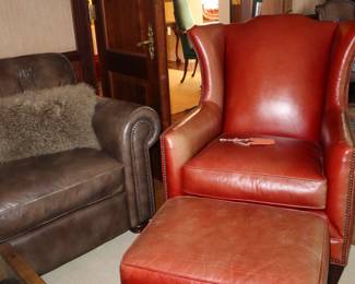 Comfortable rust color leather lounge chair with ottoman. They are for sale independently.