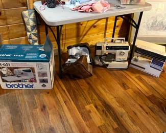 4 sewing machines, accessories, thread, thimbles, etc