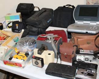 Vintage cameras, video recorders, old tvs-not smart, plug in tvs, videos, dvds