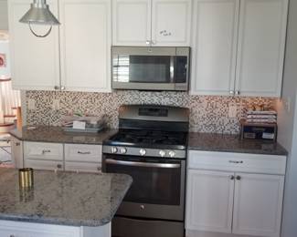 Lots of upper & lower cabinets plus an island