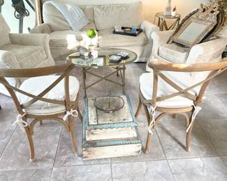 bent wood chairs and vintage wooden column base, lladro figurines