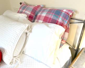 "wrought iron" queen bed with top-end linens