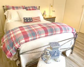 "wrought iron" queen size bed with top-end linens