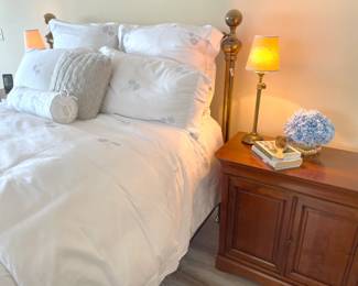 queen brass bed and french sidetables