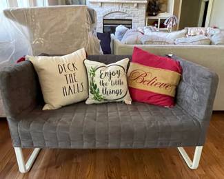 Slipcovered metal settee