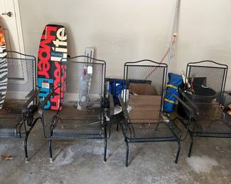 Wrought Iron patio chairs (4), surfboards in background