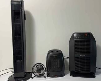 2 Portable Heaters And 2 Portable Fans 