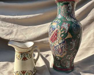 Empire China pitcher (left).  Coat of arms motif porcelain urn (right).