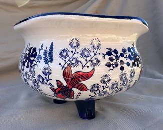 Blue floral and koi three-footed jardiniere.