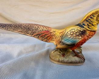 Pheasant figurine.