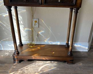 Small narrow table with faux leather top