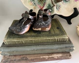 Baby shoes and vintage books