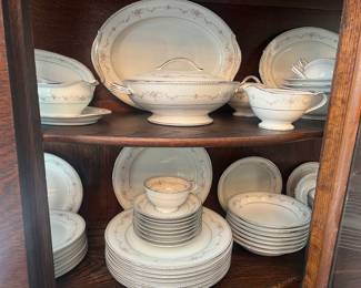 8 place settings Noritake Fairmont plus serving pieces. ( short a cup and saucer, bread and butter plate and a fruit bowl)