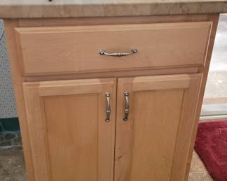Nice cabinet with cutting board top