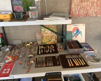 Flatware, books, marble coasters