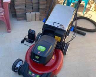 New lawnmower, used once, purchased in the last 60 days, then our old batteries to our old mower charged, IDUNNO, but like the old one because we have all of the same tools/batteries.