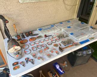 Belt buckles, a horse thingy, duck float, shoe lace stamper, misc metals things that you put on belts and leather items...IDUNNO