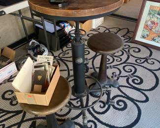 Wood and metal Bistro table and stools, fun little item but we just don't need it.