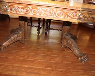 Quarter Sawn Oak,  Tiger Oak,  Claw Foot Round Carve Dining Table, Shown with Leaf.   