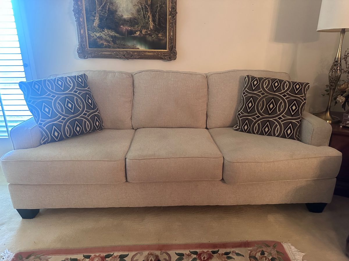 White sofa with pillows