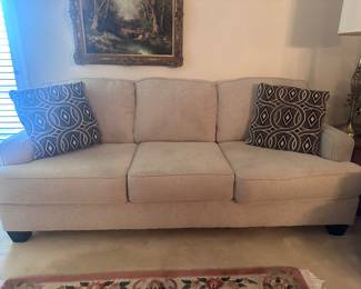 White sofa with pillows