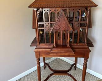 Vintage wooden birdcage on stand