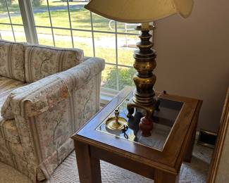 one of two end end table and brass Asian inspired lamps