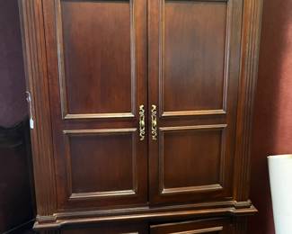 Vintage tv or wardrobe armoire - beautiful wood - would make a cool coffee bar.  