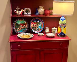 Small red distressed hutch