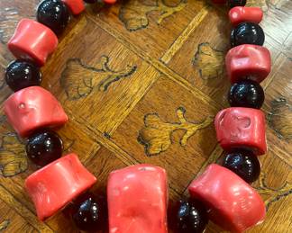 Massive coral slice and onyx choker