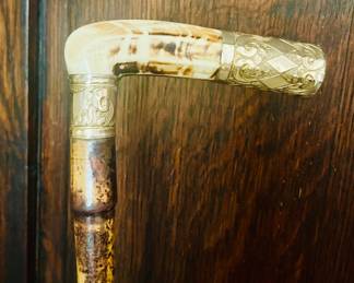 Antique cane with gold handle