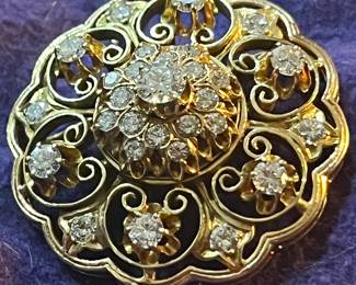 Very large “rose window” diamond brooch.  Stunning statement piece.