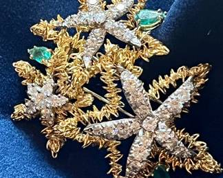 Large gold starfish brooch with emeralds and diamonds