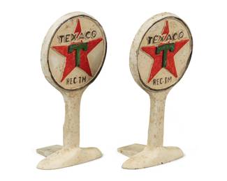 Pair of painted cast iron Texaco doorstops