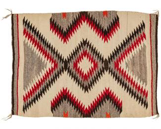 Navajo style rug with red and black diamond patterns