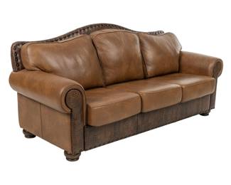 Brown leather couch with three seats