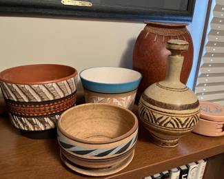 Nice selection of pottery, some shown here, including a Handarbeit planter, Native American pottery, and more.