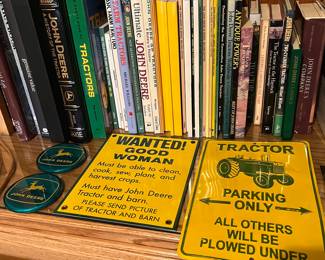 John Deere books and signs.