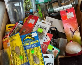 Many fishing lures and tackle.