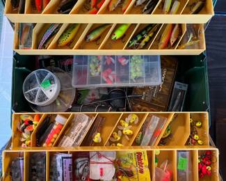 Many fishing lures and tackle.