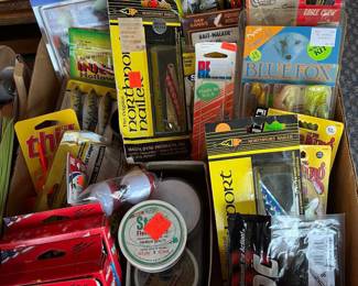Many fishing lures and tackle.