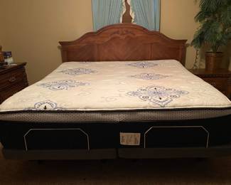 Queen size adjustable bed with remote control & wood headboard by Southerland Co.