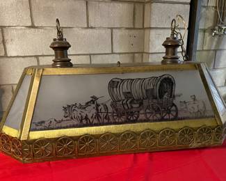 Billiard table hanging light fixture with covered wagon art
