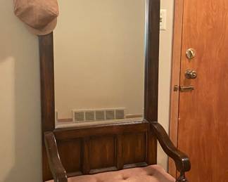 Entry hall seat with cushion, bevel mirror & hat hooks