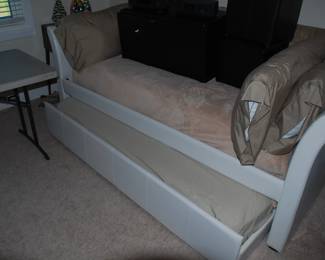 Interesting sofa/bed with a trundle bed underneath- 