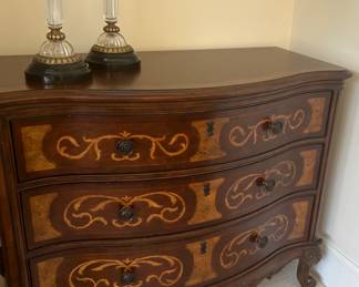Think of the linens and goodies you can store in this Thomasville chest The candle sticks are Maitland SMith